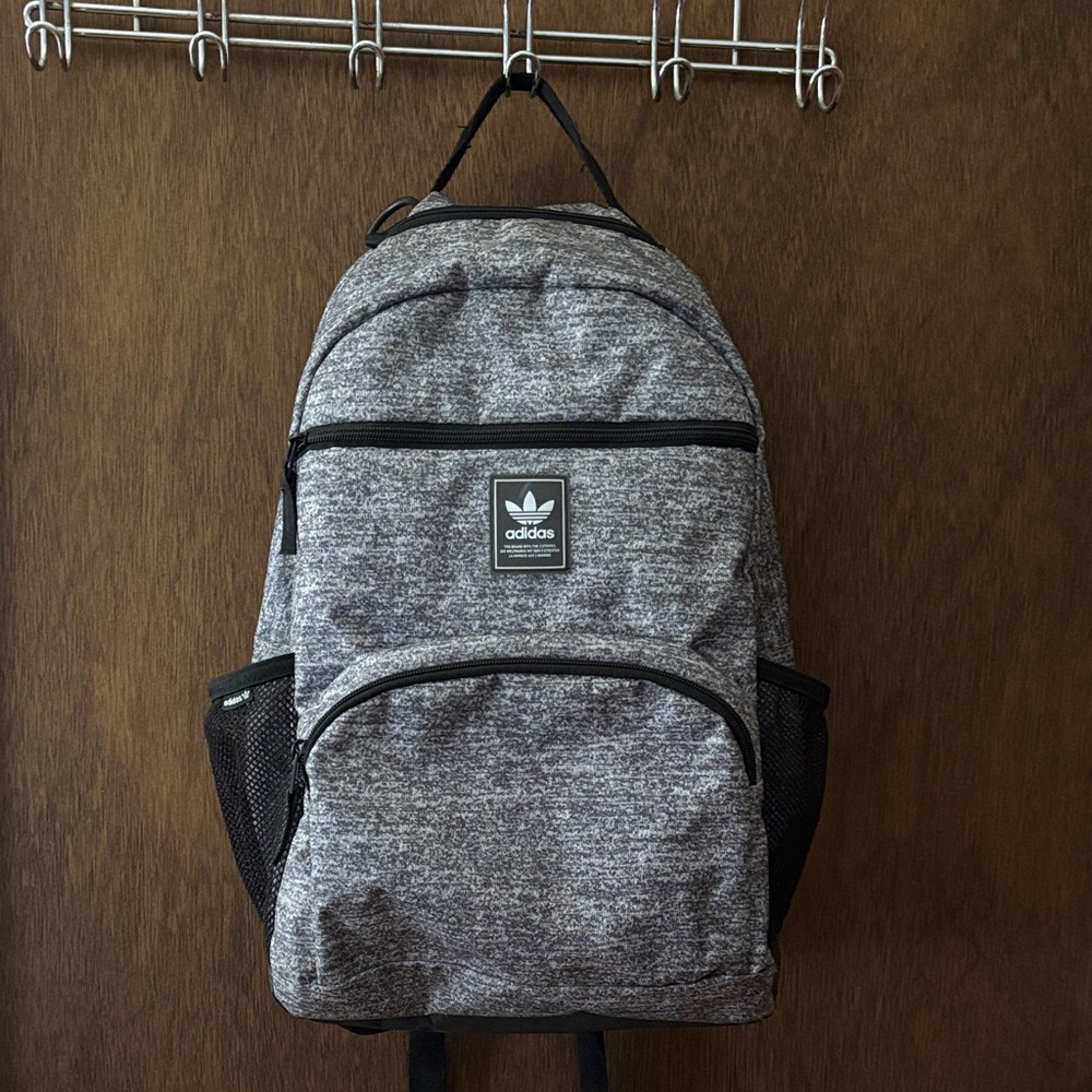 Adidas Black and Gray backpack some surface dirt but otherwise great condition